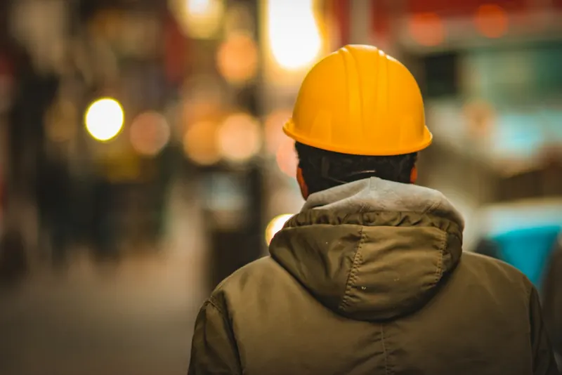 Construction worker in a yellow hard hat